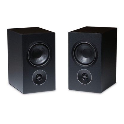 pair of psb iq1 speakers in black