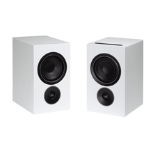 pair of psb iq2 speakers in white