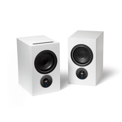 Pair of white speakers on a white background