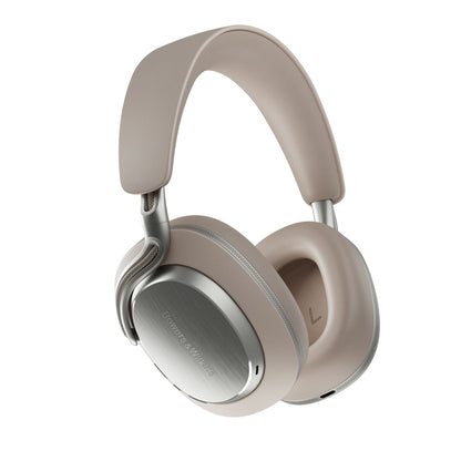 Beige headphones with silver accents on a white background