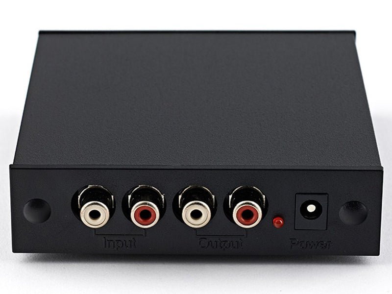 Black audio/video component with multiple connectors on a white background