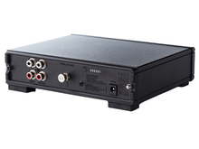 Black electronic device with audio connectors on a white background