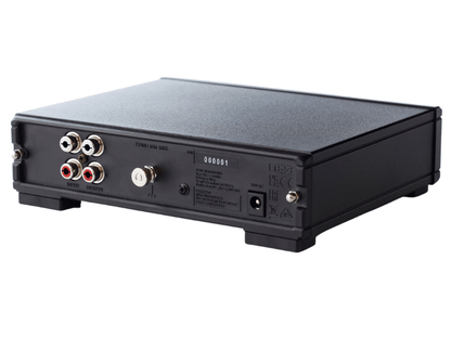 Black electronic device with audio connectors on a white background