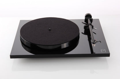 Black turntable on a white background