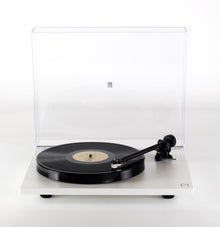 Turntable with a clear dust cover on a white background