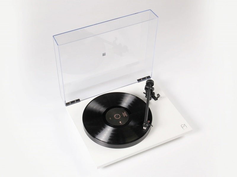Turntable with a vinyl record on a white background