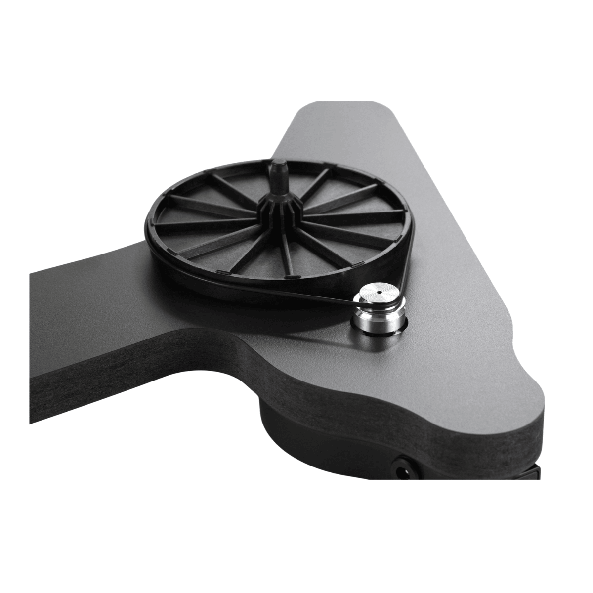 Rega Replay sub-platter detail, with the black spoked hub and drive belt looped around the polished aluminium motor pulley on a dark grey plinth.