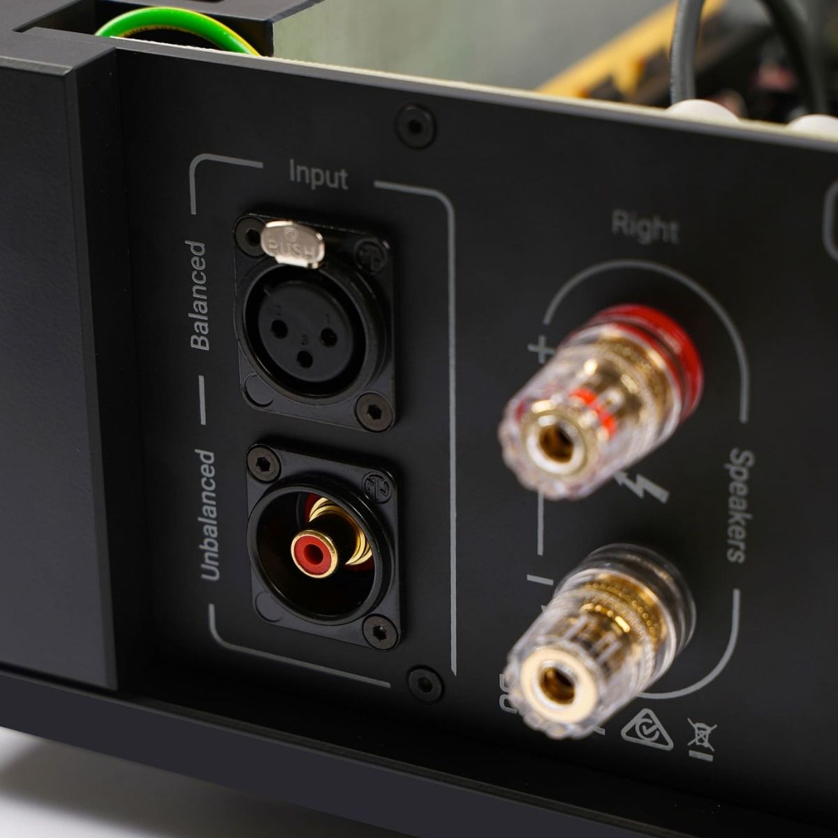 close up on back view of rega solis power amp