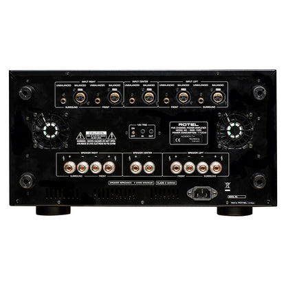 Black audio amplifier with various connectors on a white background