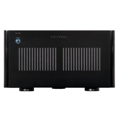 Black amplifier with 'Rotel' branding on a white background