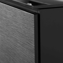 Close-up of a black and gray cabinet corner