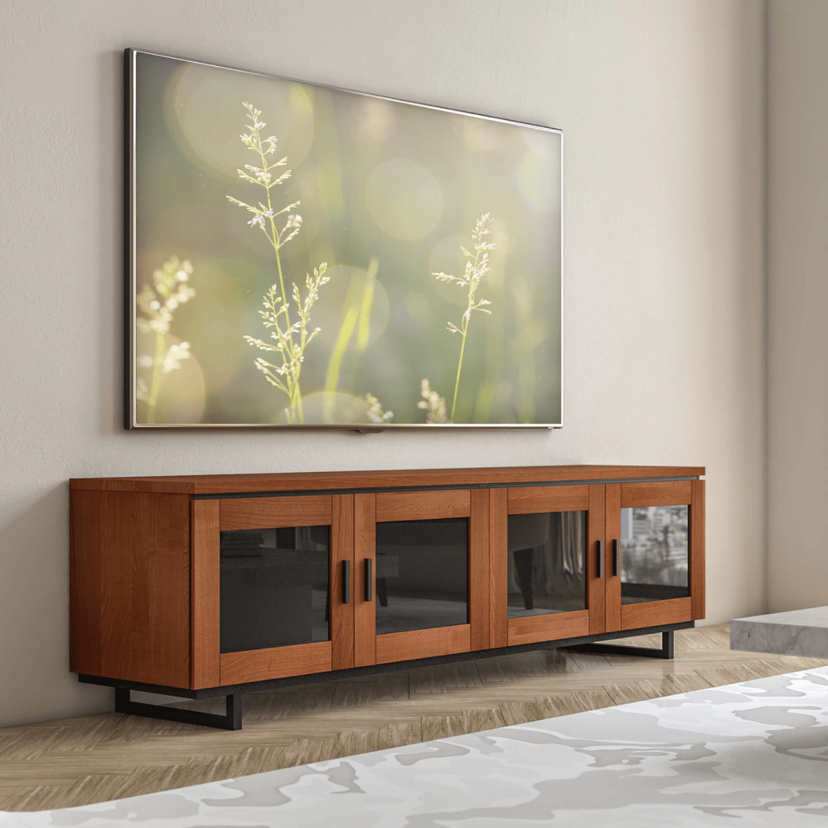 Wooden TV stand with a large screen displaying nature-themed wallpaper in a room.