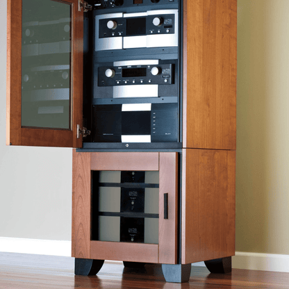 Wooden audio equipment cabinet with open door revealing audio components.