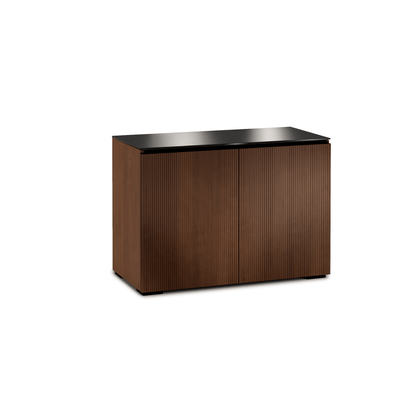 Wooden sideboard with black top on a white background