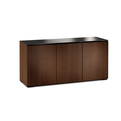 Wooden sideboard with black top on a white background