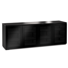 Black entertainment console with glass doors on a white background