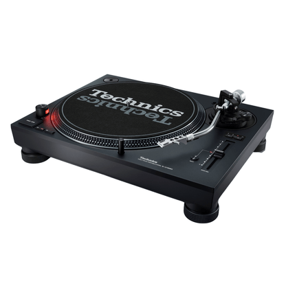 Technics SL-1210MKX turntable from a three-quarter angle, with the black chassis, illuminated start/stop and speed controls, S-shaped tonearm and height-adjustable isolation feet.