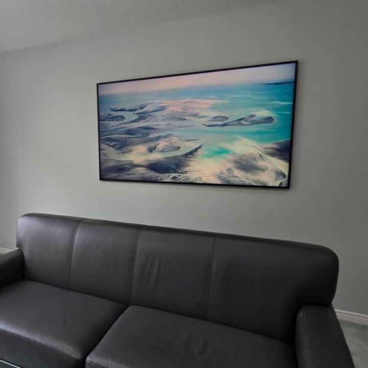 frame tv mounted on a wall